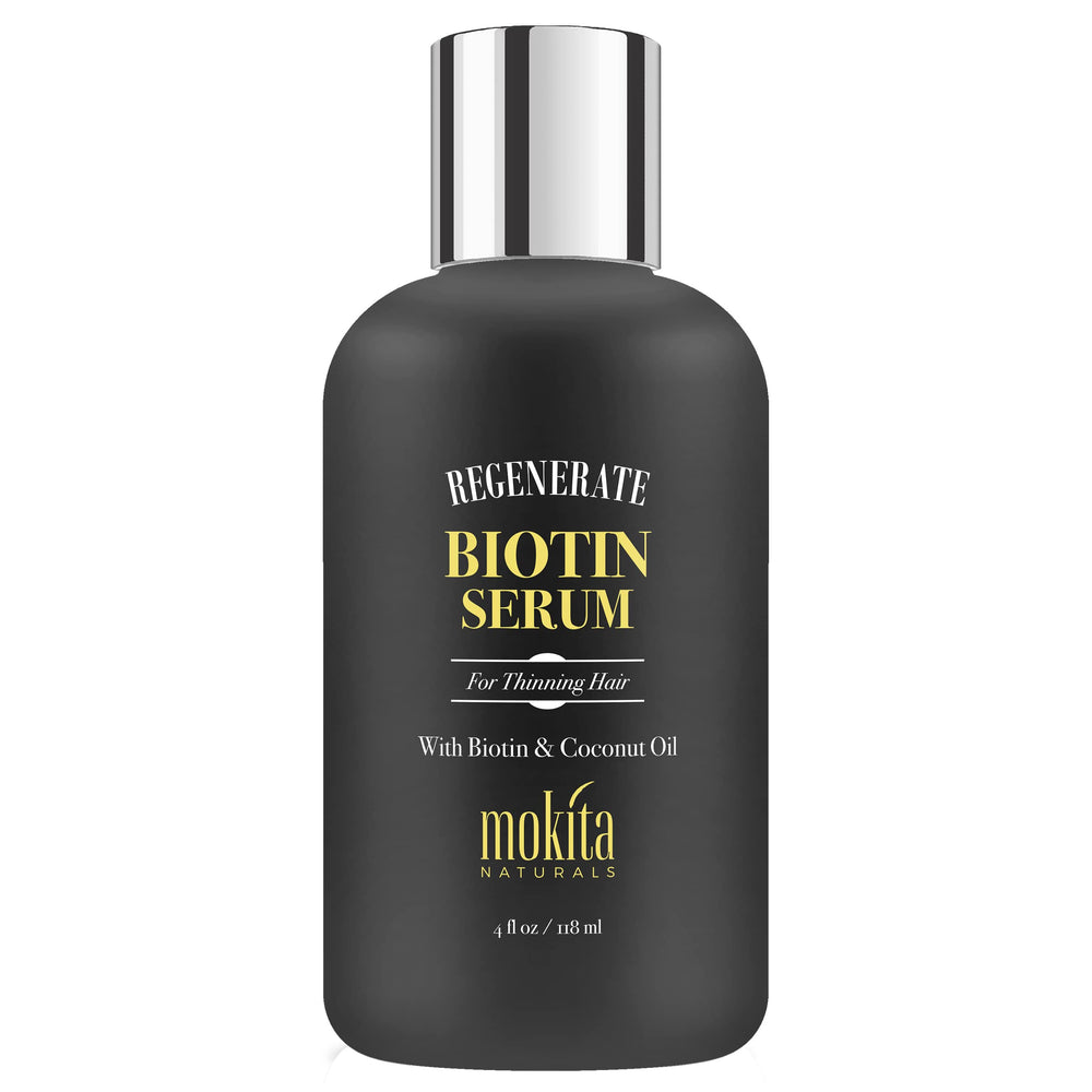 Mokita Naturals Hair Growth Serum bottle close-up highlighting paraben-free biotin for healthier-looking hair.