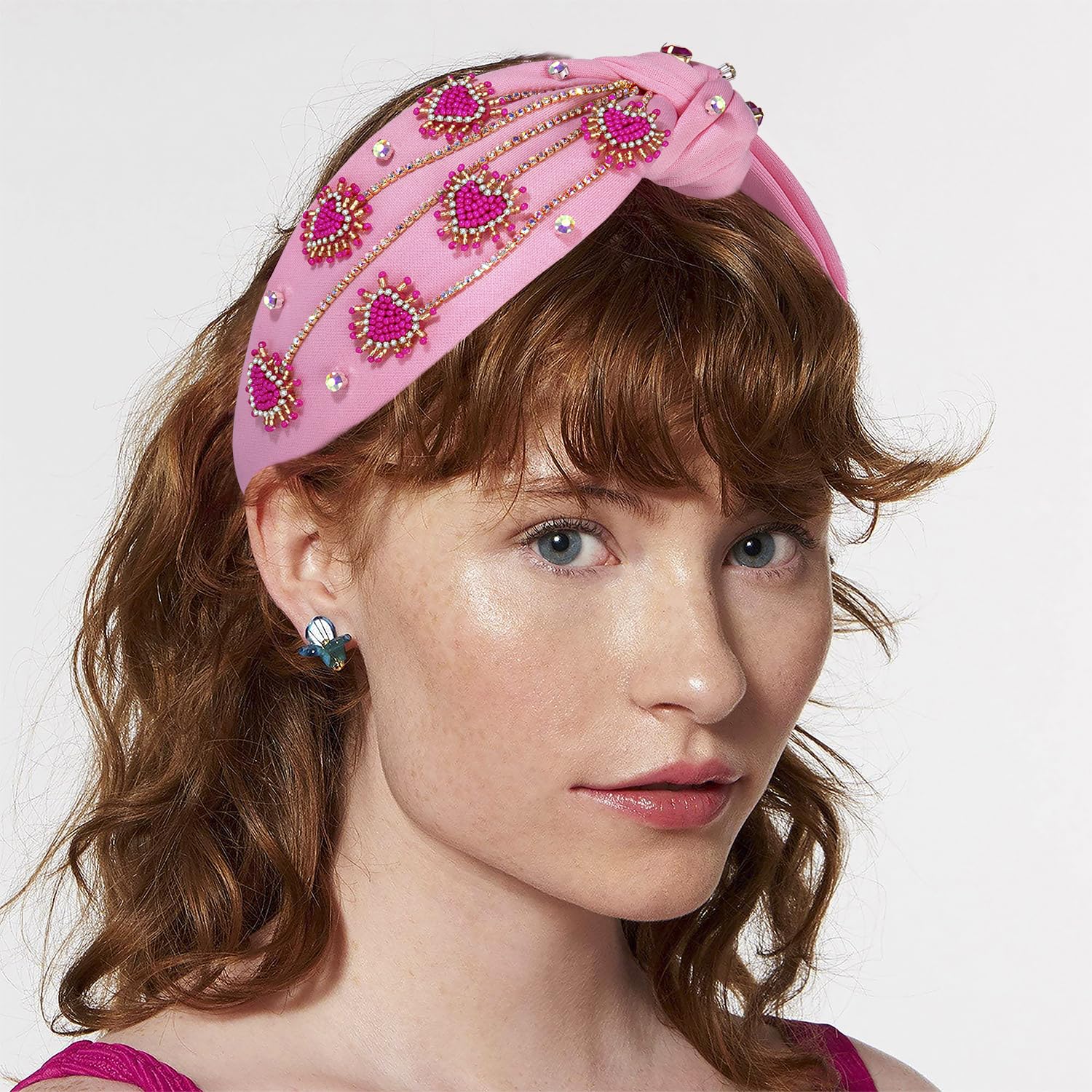 MOLOCH crystal-knotted design highlights a chic, festive look for parties.