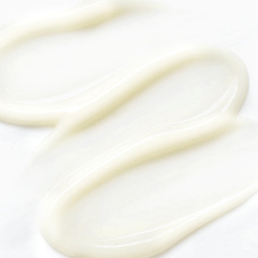 MOMOHOO Retinol Caffeine Under Eye Cream tube front highlights sleek packaging and easy application.