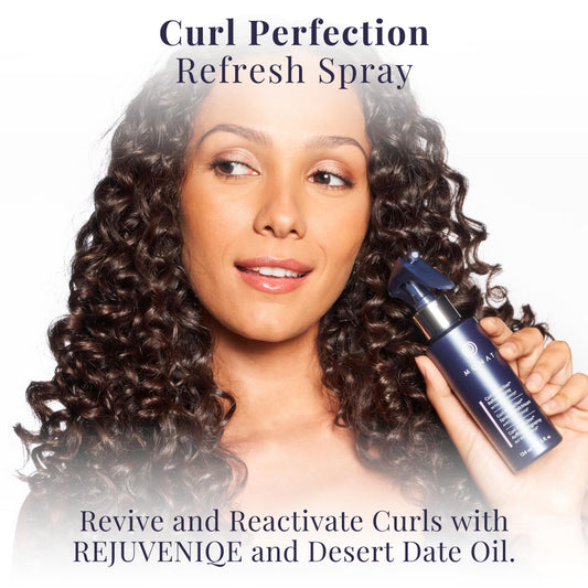 MONAT Curl Perfection Refresh Spray mist in use for applying to curls