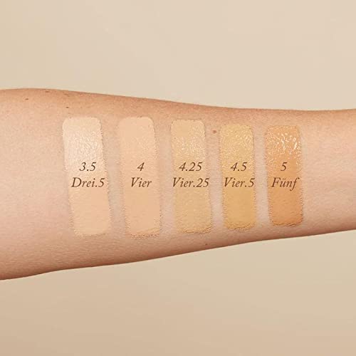 Swatch on forearm shows neutral pink undertones in shade 3.5.