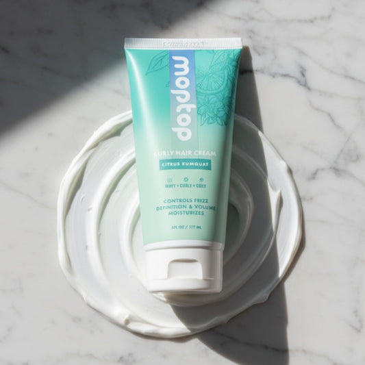 MopTop Curl Cream 6oz hair-application delivers even distribution for frizz control.
