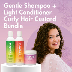 MopTop model with curly hair demonstrates defined, touchable curls.