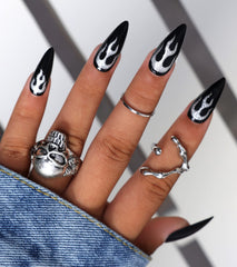Morily black press-on nails with fire pattern for instant almond manicure.