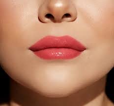 MORPHE Make It Big Brilliant Lip Plumper Haute Red on lips with glossy color and hydration