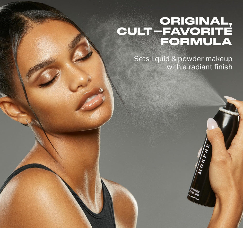 Morphe Mini Setting Mist in spray action demonstrates continuous mist for smooth application.