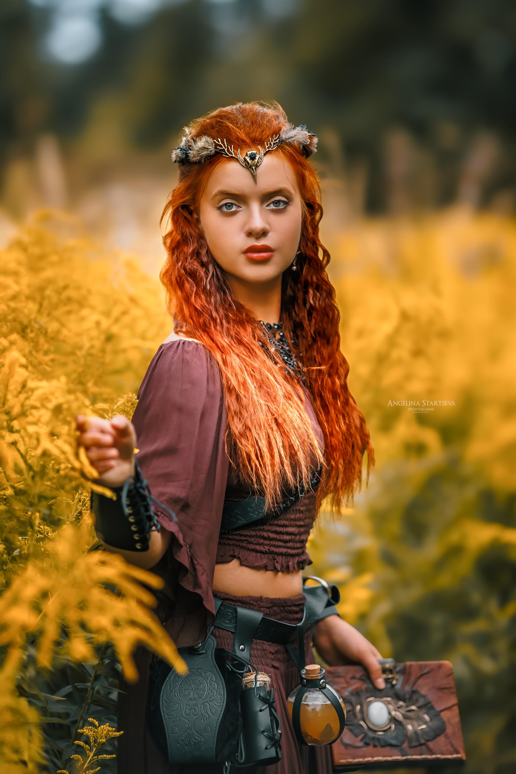 MOSTORY brown feather witch crown, side view, adjustable fit for comfort.
