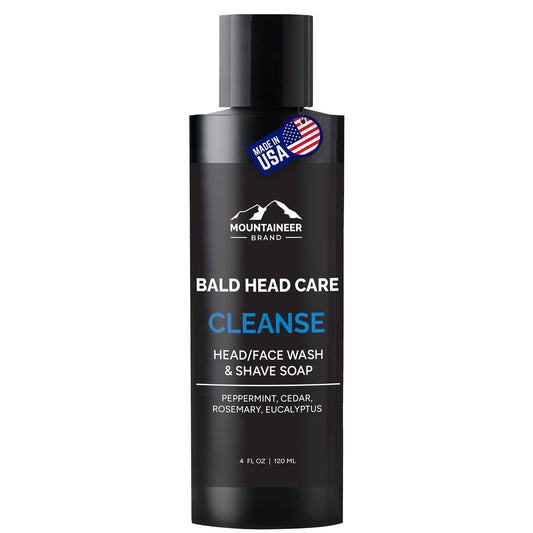 Mountaineer Brand Bald Head Wash bottle highlighting natural scent and clean formula.