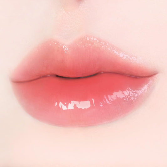 MQNY Dewy Water Glow Lip Tint Peach Beige close-up with natural lip blend