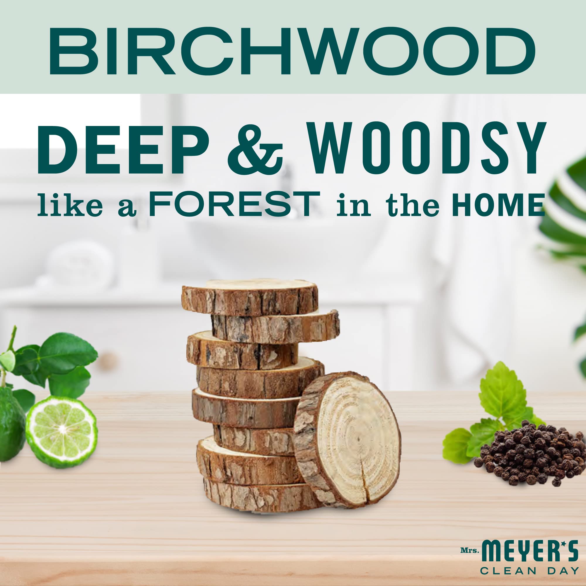 Mrs. Meyer's Clean Day Birchwood bar soap held in hand shows versatile use for hands and body.