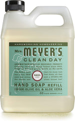 Refill bottle pouring to refill a hand soap dispenser