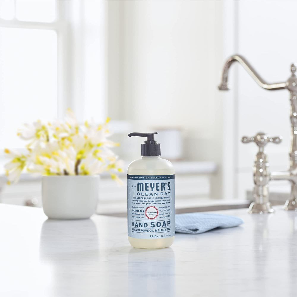 Close-up of Snowdrop scent bottle evokes cozy winter home atmosphere