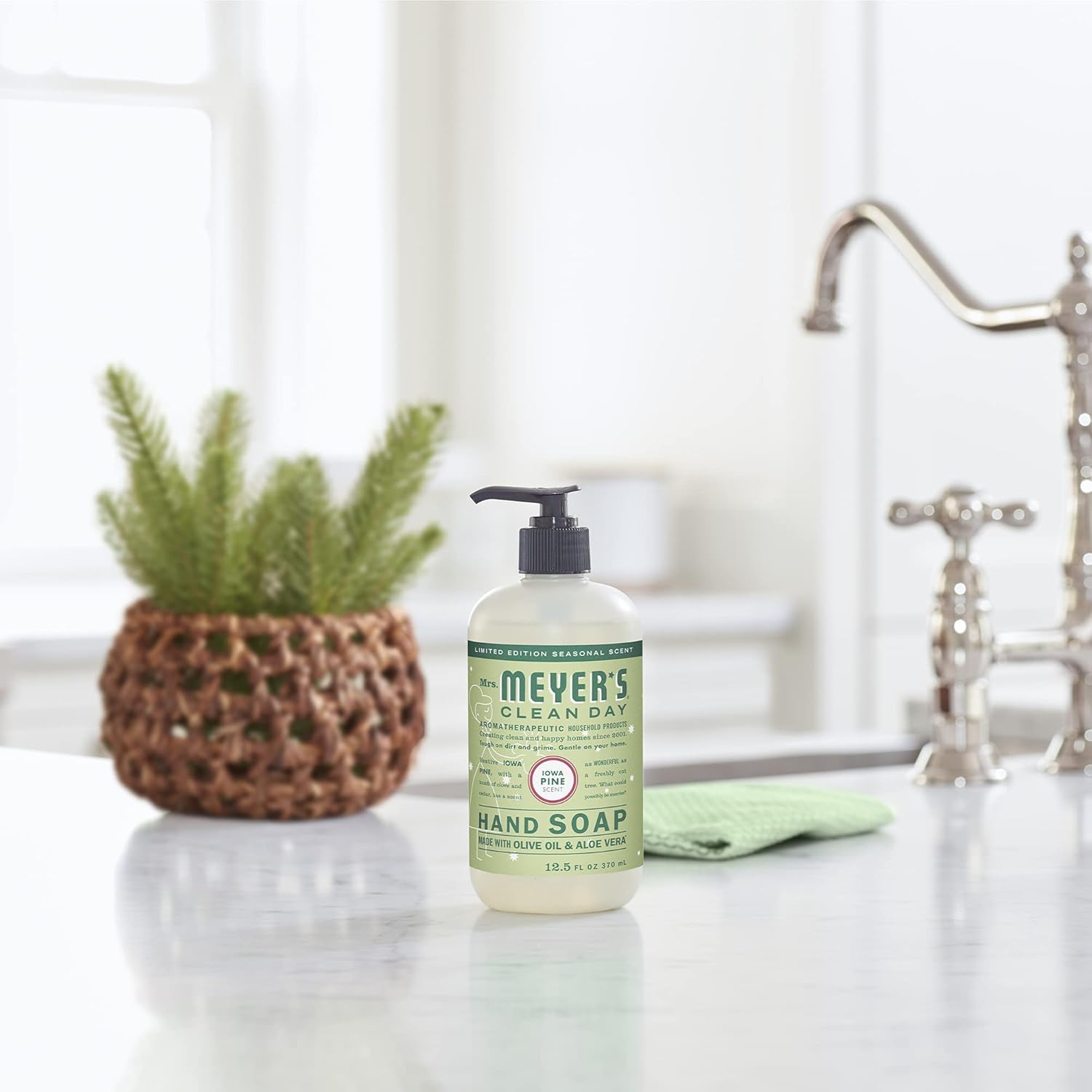 Mrs. Meyer's Snowdrop hand wash lather closeup highlights moisturizing feel after use.