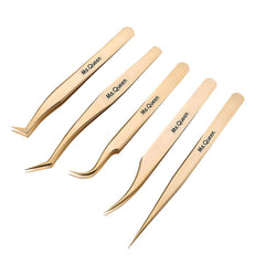 Ms.Queen golden tweezers top view for precise lash placement during extensions.