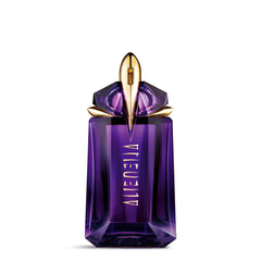 Mugler Alien bottle closeup showcasing premium glass and elegant silhouette for daily confidence.