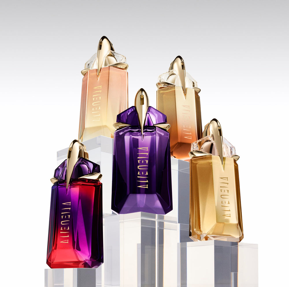 Mugler Alien star emblem evokes bold confidence and iconic branding.