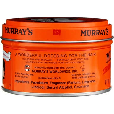 Thick curly hair held in place by Murray's pomade.