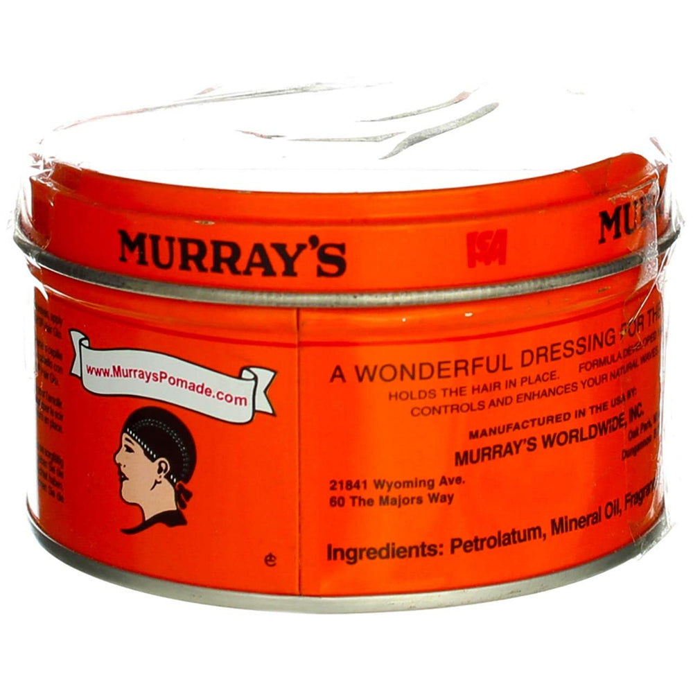 Hair with Murray's pomade and comb showing structured, defined texture.