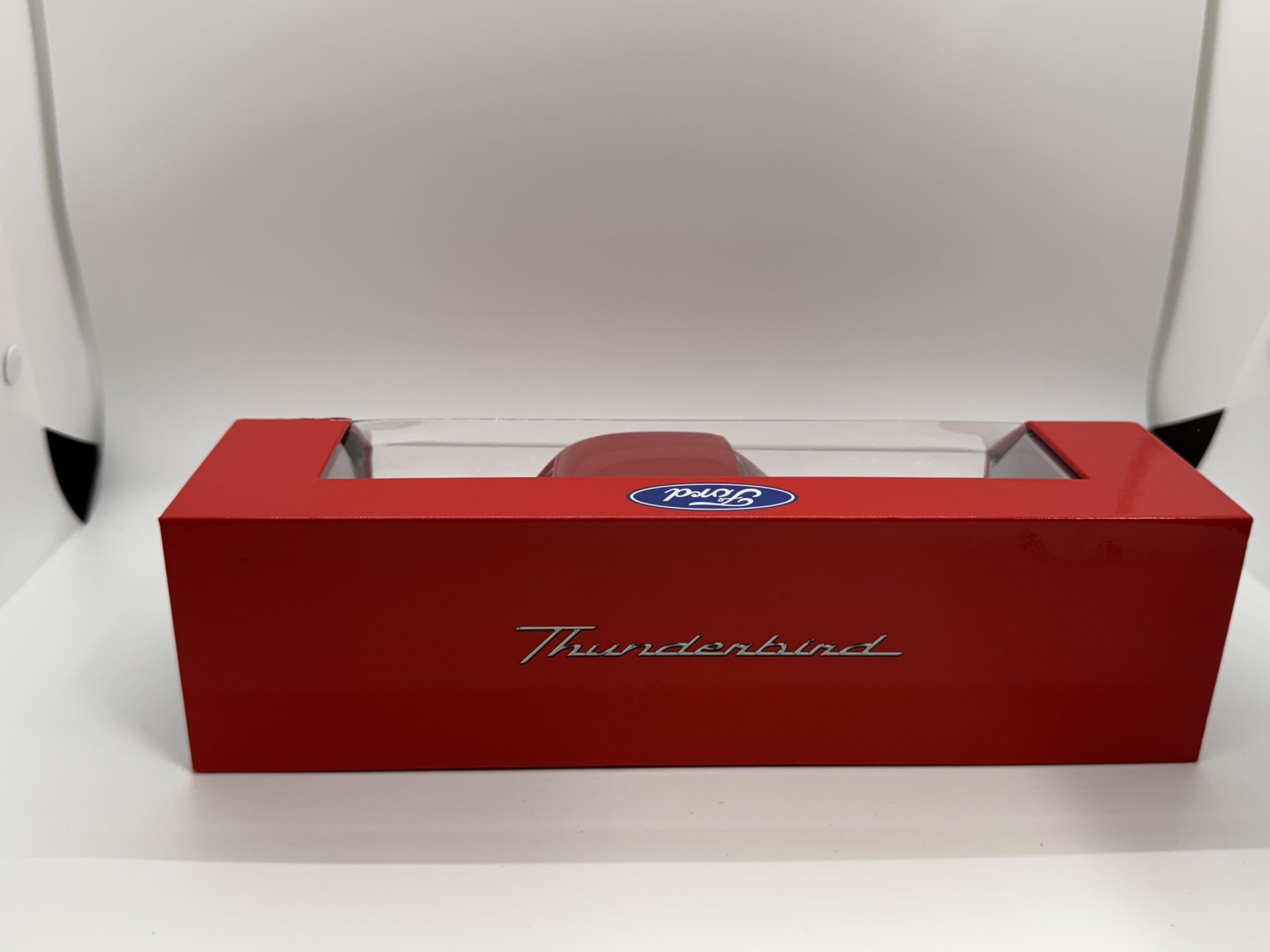 Mustang Thunderbird collectible bottle on shelf, modern vanity display