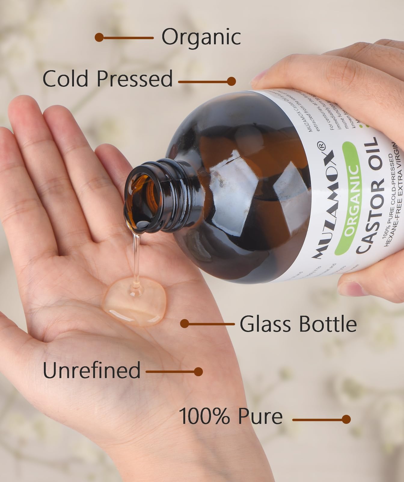 MUZAMOX castor oil on scalp supporting potential hair growth and follicle nourishment