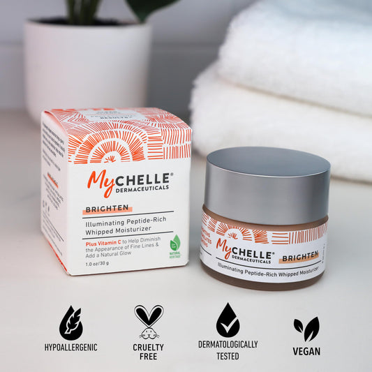 MyCHELLE Illuminating Peptide-Rich Whipped Moisturizer pump action showing easy application