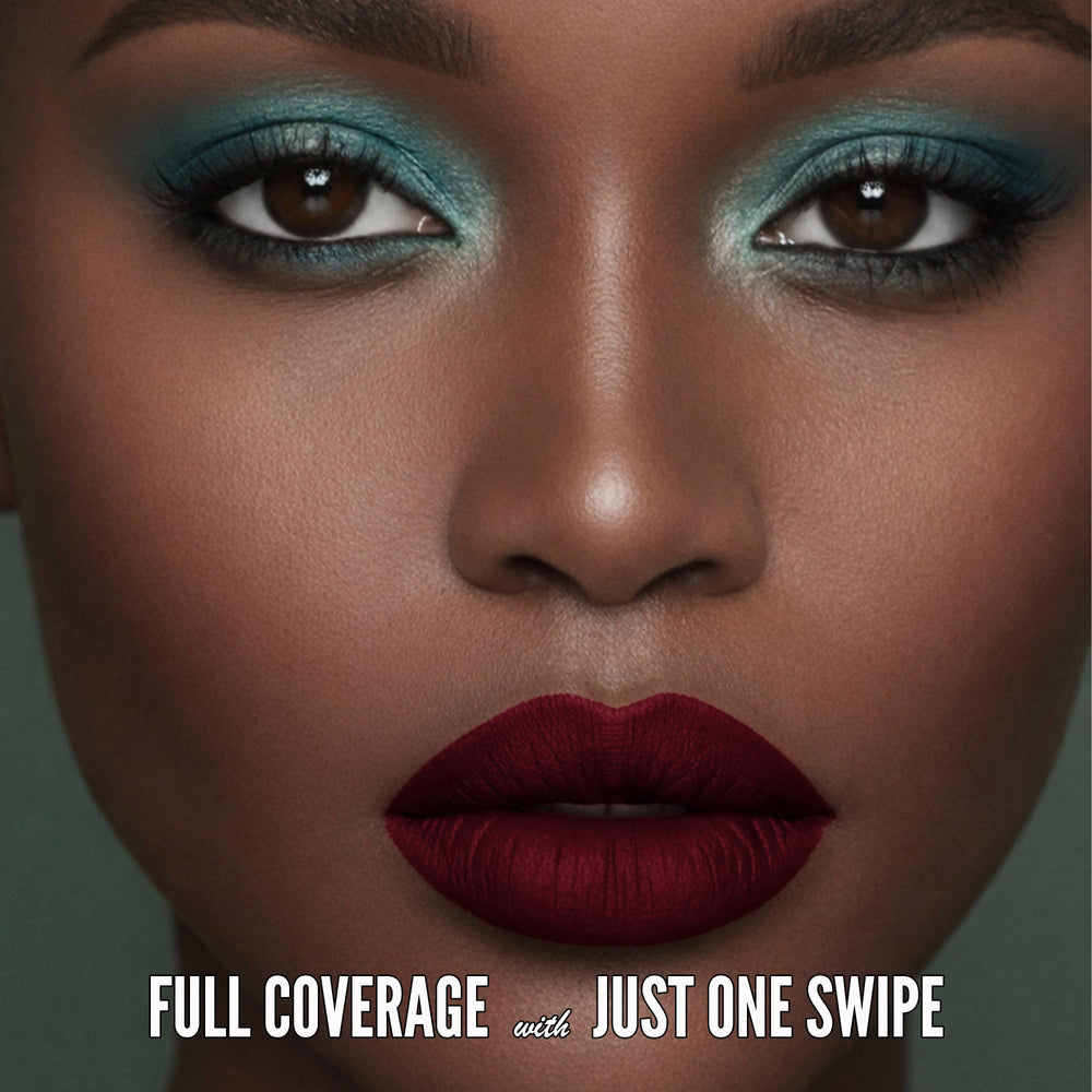 Mynena Burgundy Red applied on lips demonstrates full coverage in one swipe.