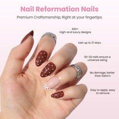 Nail Reformation polka dot French tip pink nails for quick chic looks.