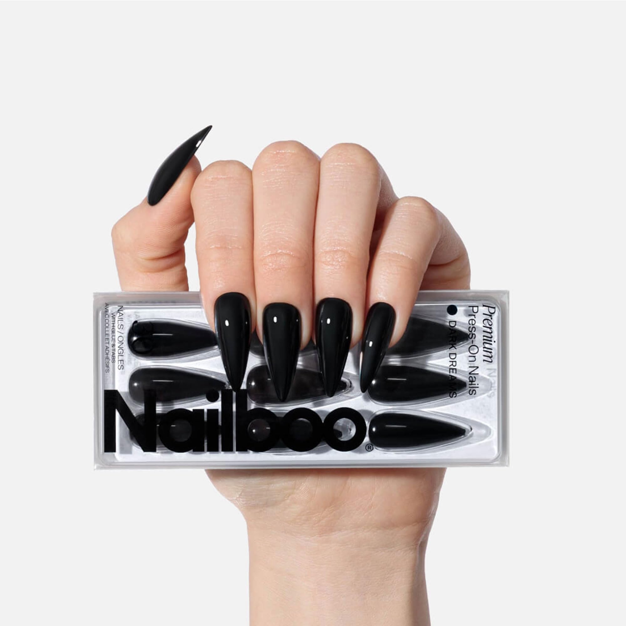 Nailboo Dark Dreams stiletto press-on nails for quick salon-style manicure at home.