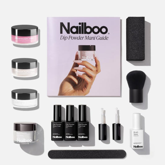 Nailboo dip powder kit with three powders for at-home manicures.