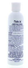 Nairobi Dandra-Solv foam on hand demonstrating gentle cleansing