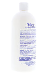 Nairobi Detoxifying Shampoo bottle on shower shelf signals routine care access.