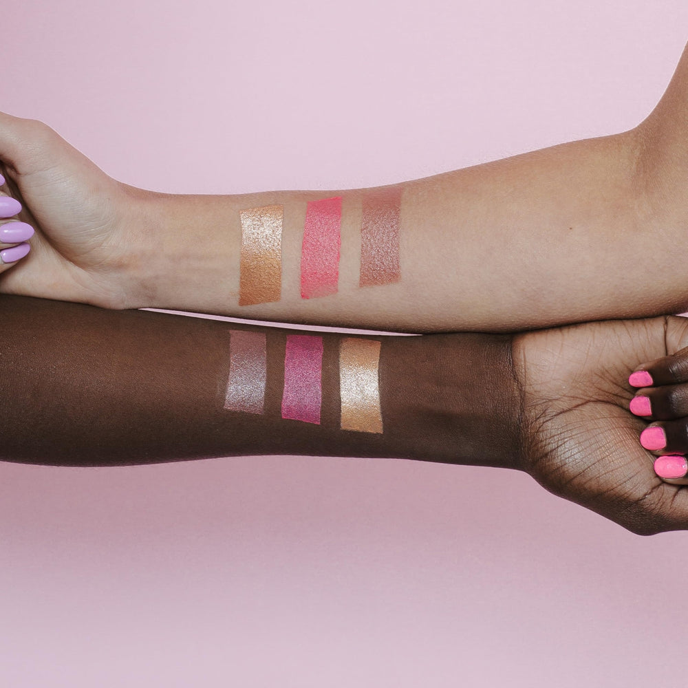 Naked Sundays Glow Balm used on lips and eyelids for cohesive pink flush