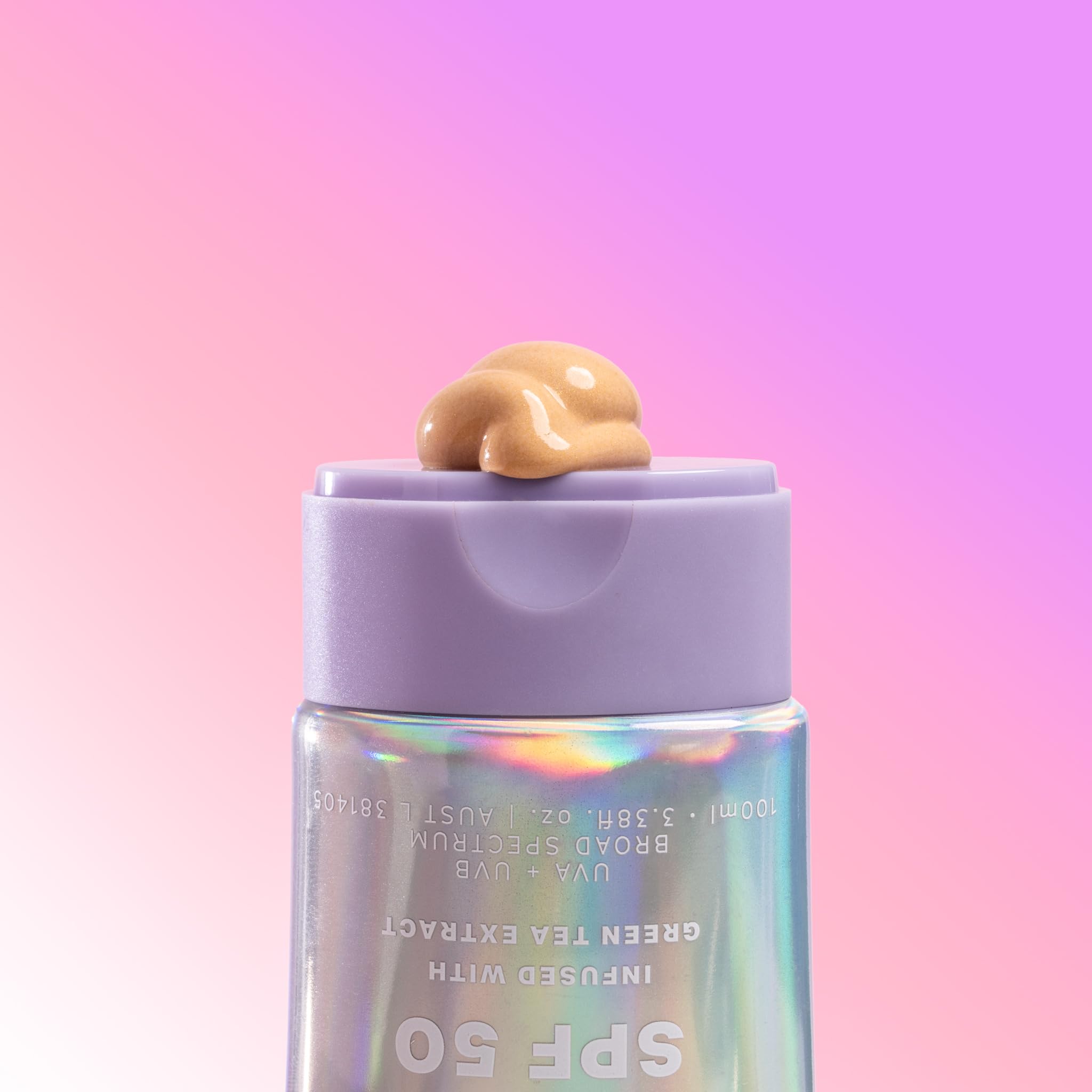 Naked Sundays SPF50 Golden Glow shimmer detail highlights radiant, sun-protected look.