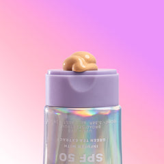 Naked Sundays SPF50 Golden Glow shimmer detail highlights radiant, sun-protected look.