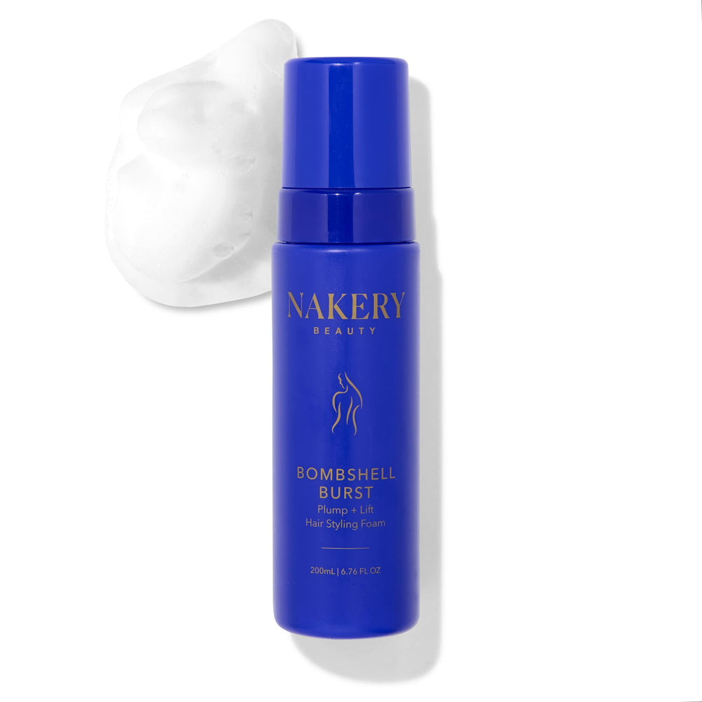 Nakery Bombshell Burst Hair Foam bottle dispensing foam for quick volume and lift.