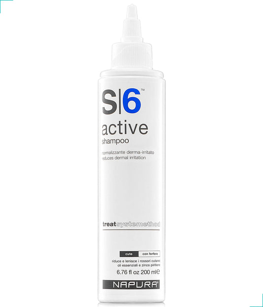 NAPURA S6 anti-dandruff shampoo bottle on bathroom shelf for clear scalp