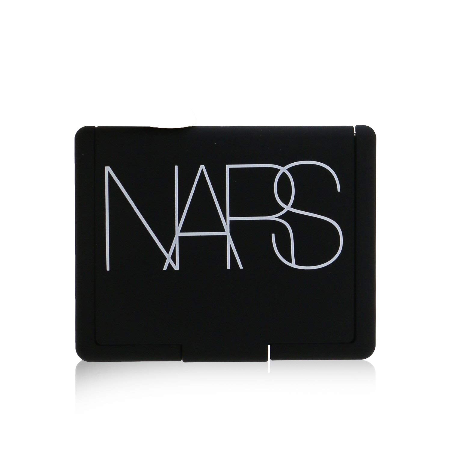 NARS Blush Dominate brush application demonstrates seamless color lift.