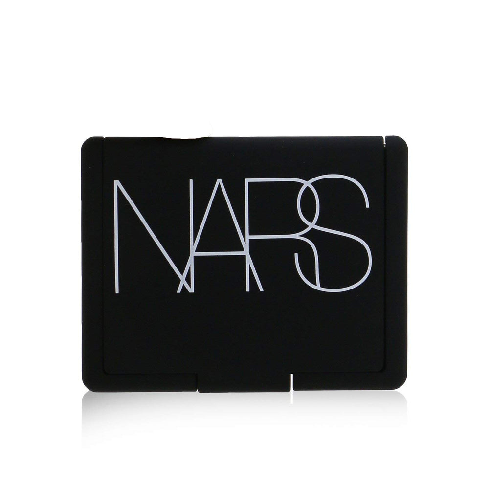 NARS Blush Dominate brush application demonstrates seamless color lift.