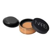 NARS Light Reflecting Setting Powder loose in Shore shade for a natural, long-lasting finish.