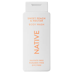 Native Body Wash Sweet Peach Nectar bottle in a clean bathroom for a refreshing daily cleanse.