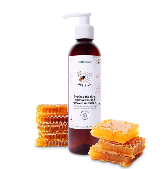 NatShop Bee Silk Body Lotion bottle highlighting olive oil for daily hydration and skin softness.