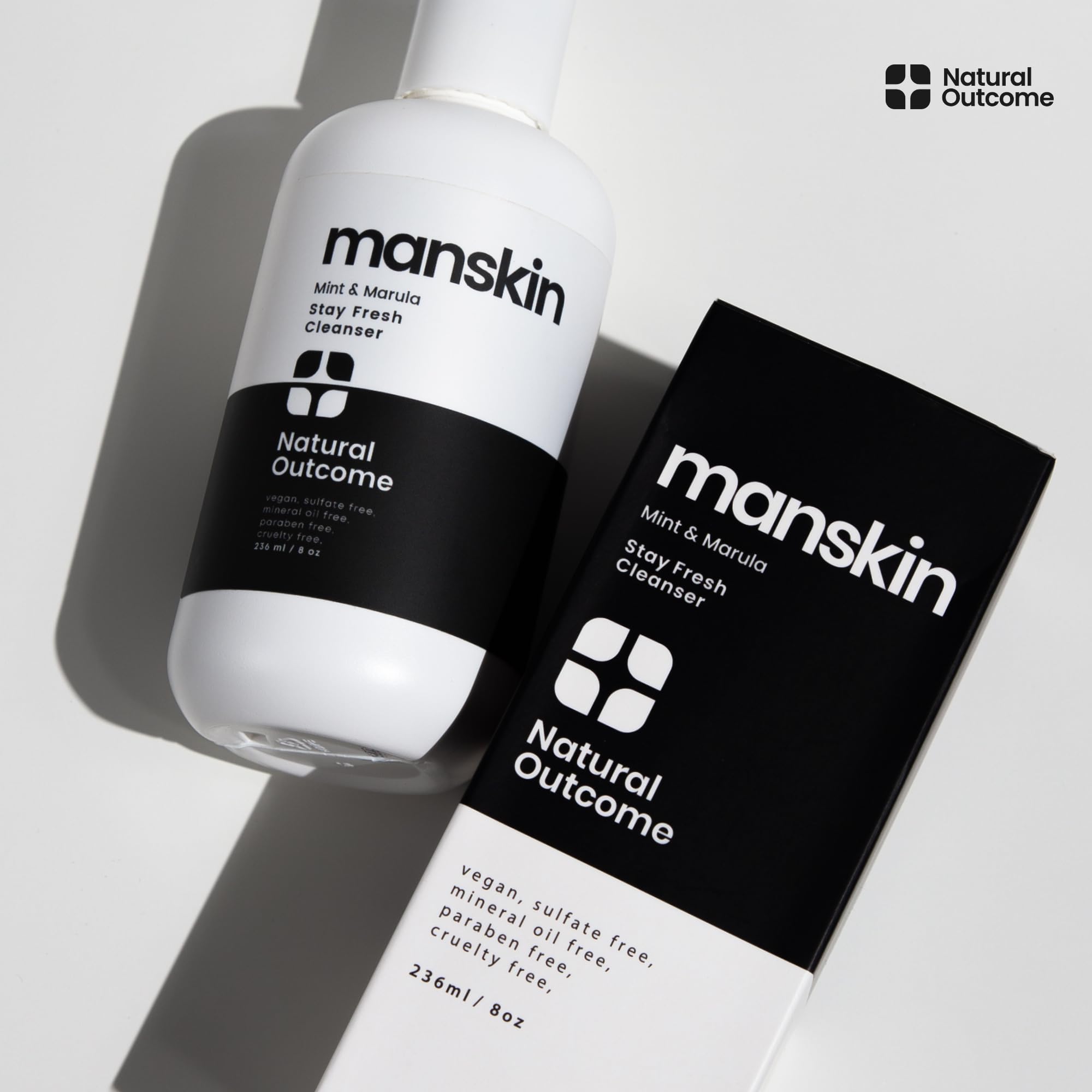 Natural Outcome packaging front highlighting mint and marula oil.