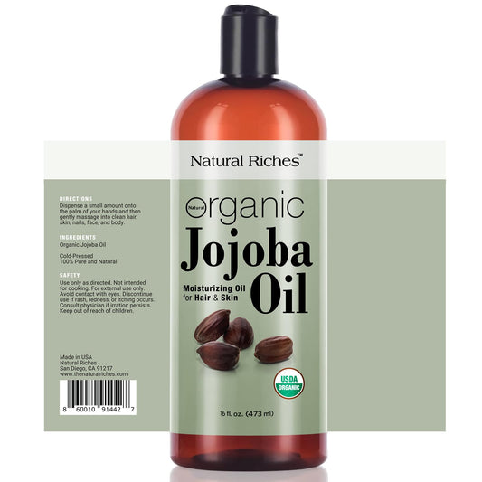 Natural Riches Jojoba Oil pour demonstrates its smooth texture ideal for quick skin absorption.