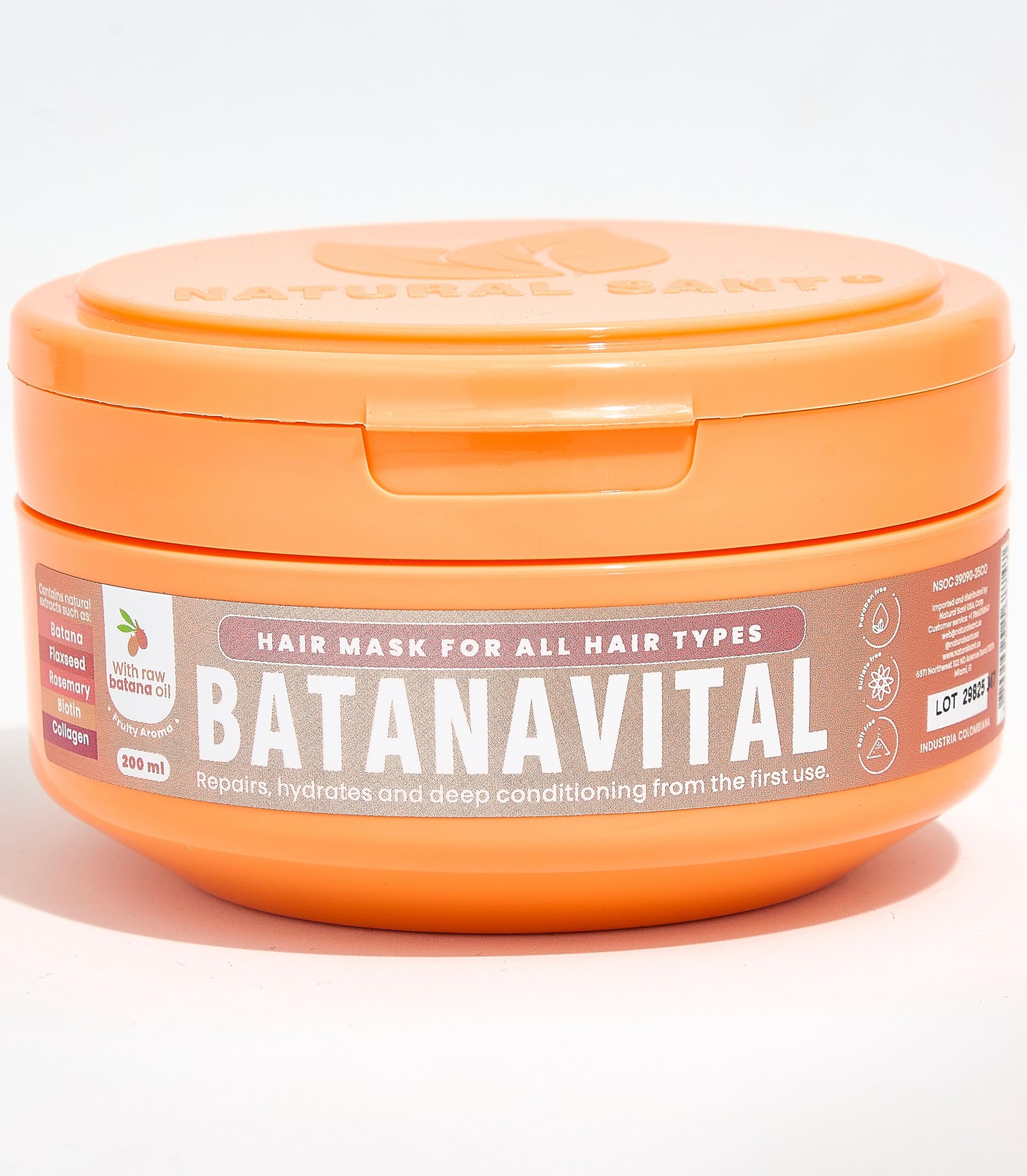 Natural Sant Batanavital batana oil jar closeup for deep nourishment.