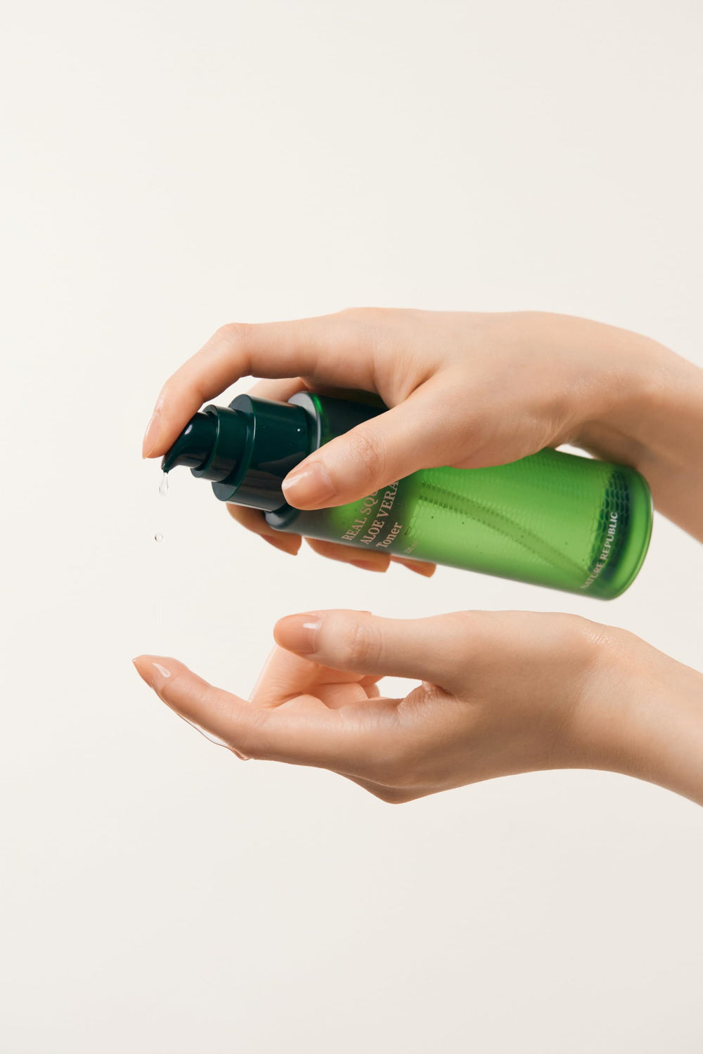 Nature Republic Real Squeeze Aloe Vera Toner on a dresser suitable for all skin types.