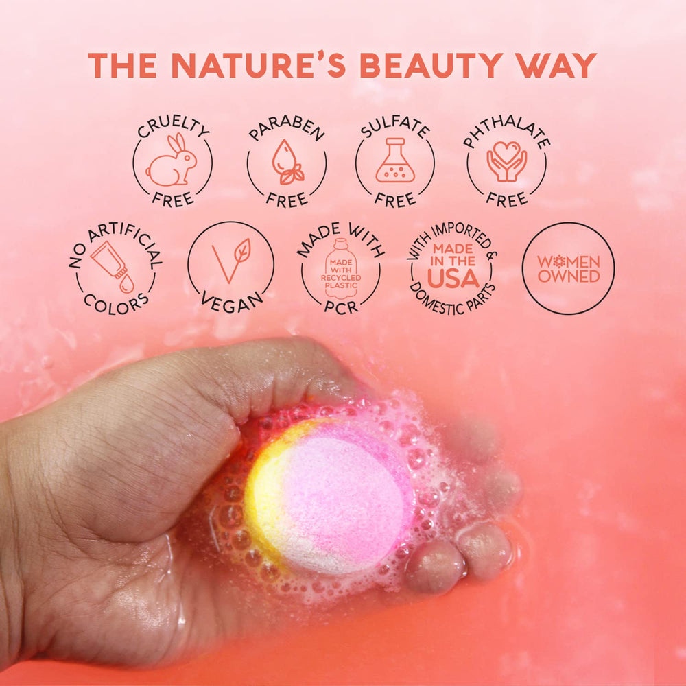 Nature's Beauty Dreamsicle bombs fizzing in water showing color-safe formula
