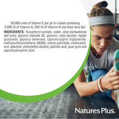NaturesPlus Vitamin E Cream on face during daily skincare routine.