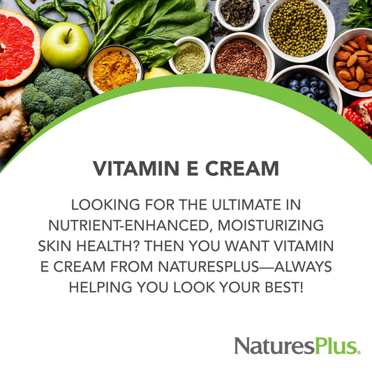NaturesPlus Vitamin E Cream applied to hands for soothing moisture.