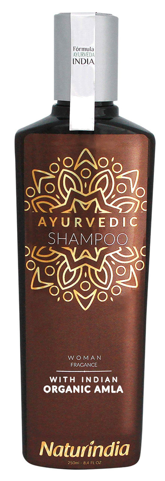 Naturindia Amla hair growth shampoo bottle promotes gentle cleansing for thinning hair.