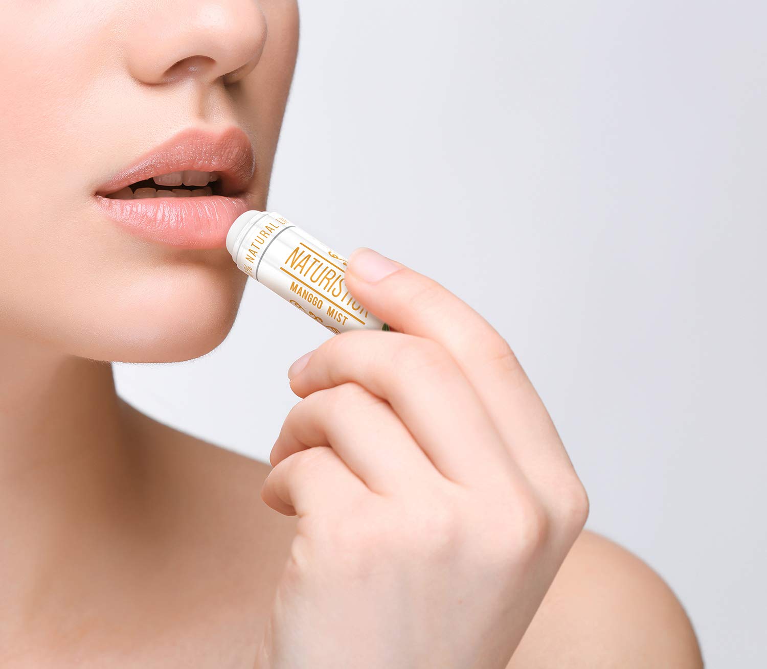 Naturistick lip balm tubes close-up showing natural ingredients and non-greasy finish